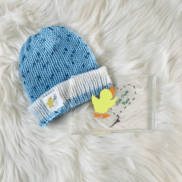 Reversible blue and white baby hat